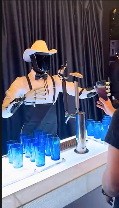 Tesla Optimus pouring beer image